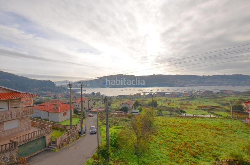 Foto 115edbf3-3617-43cb-b16c-44a2f70392bb. Casa bifamiliare con parcheggio in Moaña