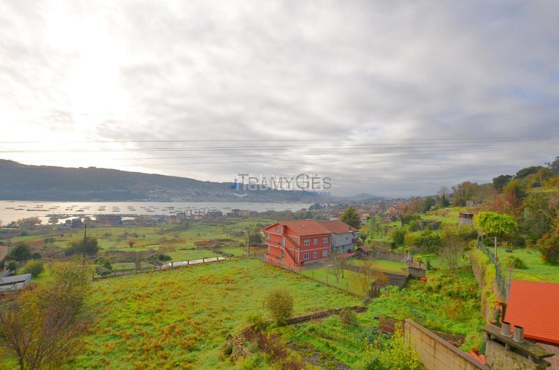 Foto 6826f95b-2b5a-41d1-aaa6-4388fbb1f553. Casa bifamiliare con parcheggio in Moaña