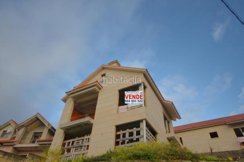 Foto 792f0910-fbf6-4676-84f3-f0b1da265bd3. Casa bifamiliare con parcheggio in Moaña