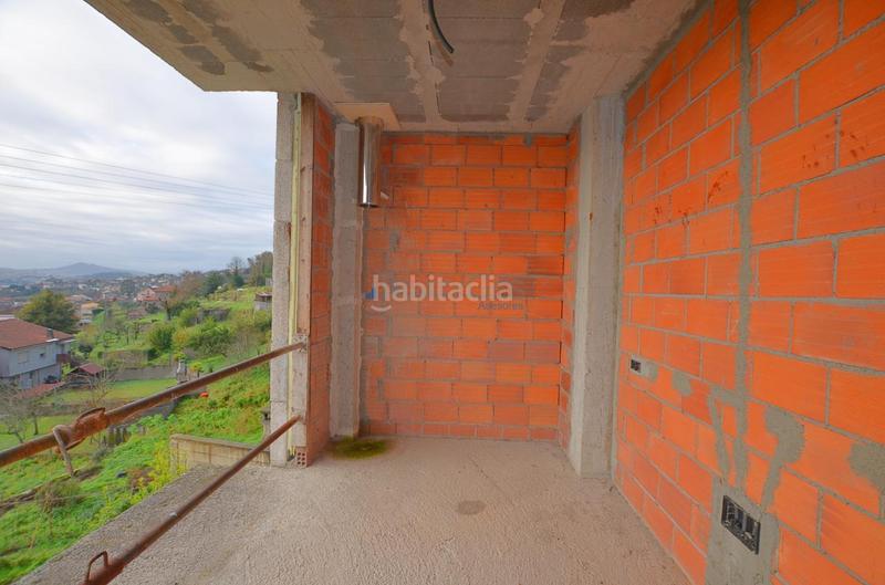 Foto cd1c312f-ac00-42d5-aadf-d91348706b36. Casa bifamiliare con parcheggio in Moaña