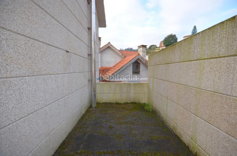 Foto fc256d56-7f94-4428-ab08-592fe5968779. Casa bifamiliare con parcheggio in Moaña