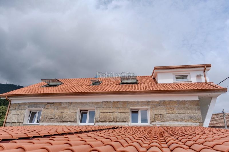 Foto c1e39df3-5d89-466e-ba6b-2c22977c3dba. Casa en Vilaboa