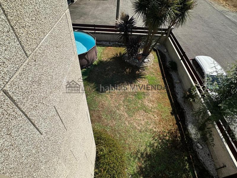 Foto 6b98f923-a9fe-42c7-8259-cdeca019622c. Casa aparellada amb calefacció aparcament piscina a San Cibrao das Viñas