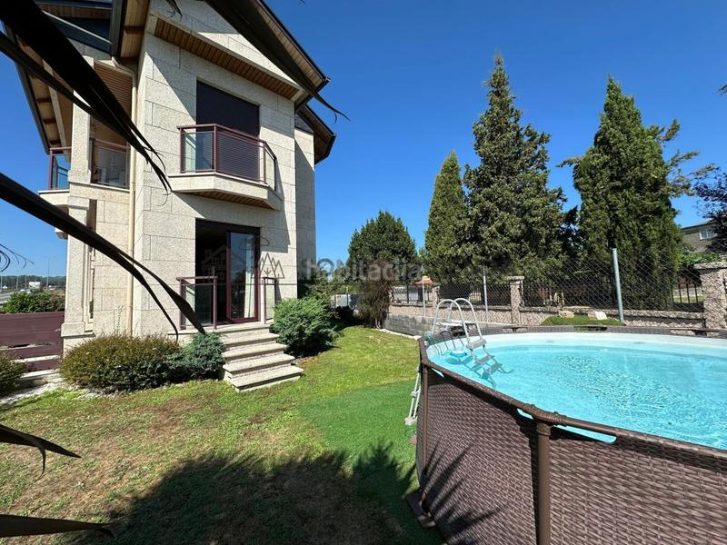 Foto 6bdb6492-648e-4668-b46b-da6d7f00da0d. Casa aparellada amb calefacció aparcament piscina a San Cibrao das Viñas