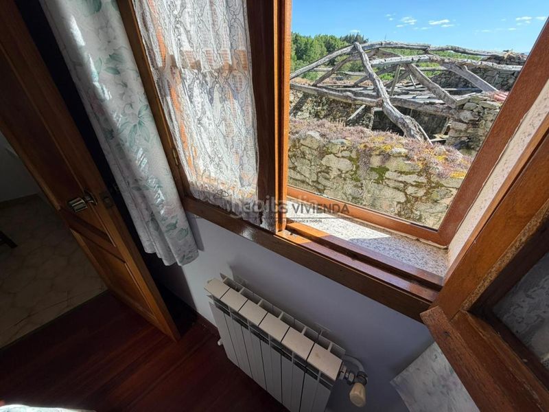 Foto a059310a-6192-4a0c-ac4c-9e5a849c3ec7. Casa amb calefacció a Nogueira de Ramuín