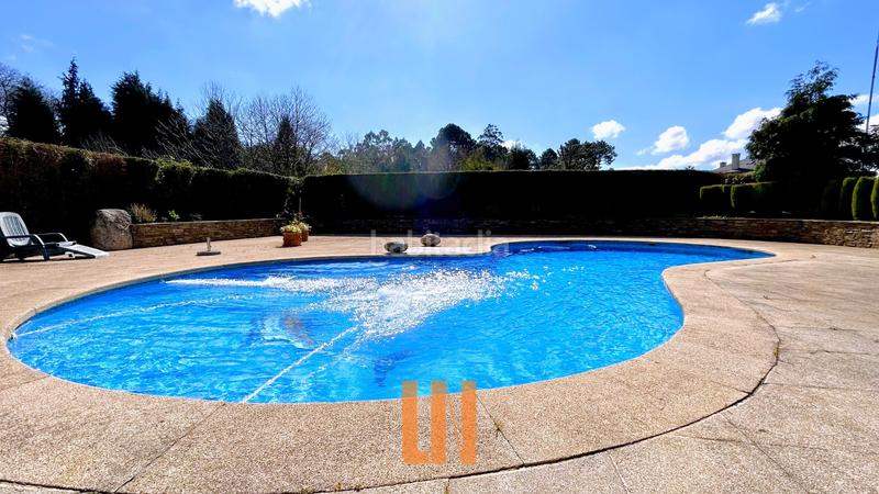 Foto 0c98d855-3356-483b-8651-0f509975cd76. Xalet amb xemeneia calefacció aparcament piscina a Oleiros