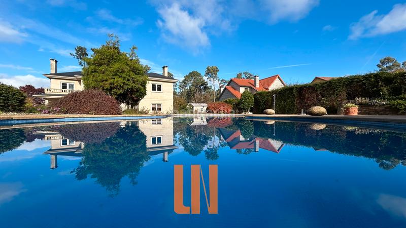 Foto 170769e2-8dba-4794-8d5a-7f6470ccffe6. Xalet amb xemeneia calefacció aparcament piscina a Oleiros