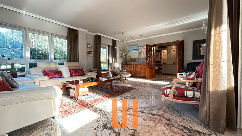 Foto 286af005-c95a-4ca0-a60e-d544e33792b3. Xalet amb xemeneia calefacció aparcament piscina a Oleiros