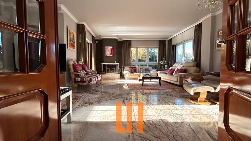 Foto 3abfb37d-7f70-478c-8ab9-a4f174560e5a. Xalet amb xemeneia calefacció aparcament piscina a Oleiros