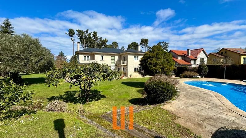 Foto 46a2c291-b3d3-4626-b356-56365c6a2c2c. Xalet amb xemeneia calefacció aparcament piscina a Oleiros