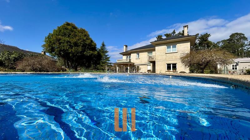 Foto 94d3fe74-6271-445e-a906-fb68860d09eb. Xalet amb xemeneia calefacció aparcament piscina a Oleiros