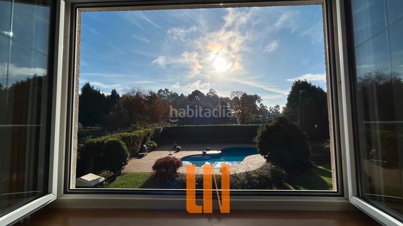 Foto dacf1304-5b2e-43d1-903a-02ced018243b. Xalet amb xemeneia calefacció aparcament piscina a Oleiros