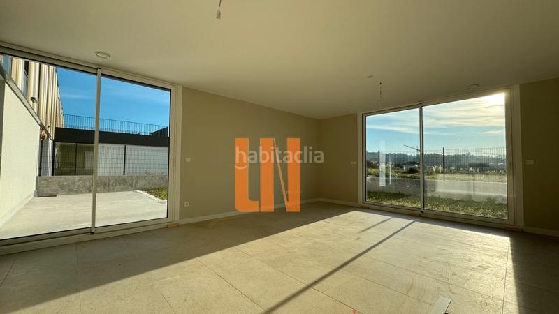 Foto 020f9eda-dd07-4429-99ef-eb6daa2d3022. Casa aparellada amb xemeneia calefacció aparcament a Oleiros