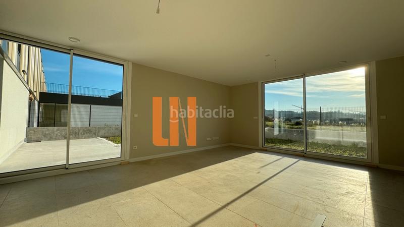 Foto 4768d96e-90df-4984-bd74-57faa80c5ae1. Casa bifamiliare con riscaldamento parcheggio in Dorneda Oleiros