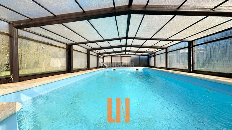 Foto 0fc9bdc3-8de2-41c0-b9ec-4c3f0f37ccce. Xalet amb calefacció piscina a Nós Oleiros