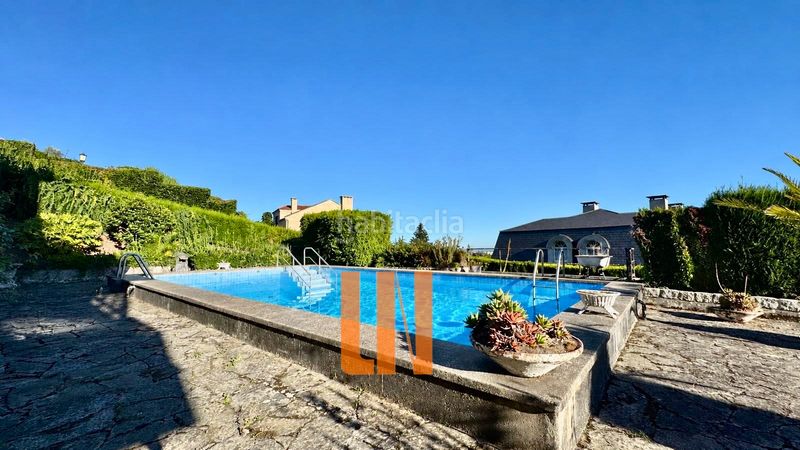 Foto 605eb5ca-dc29-4a81-b22d-e9f26a06ffc7. Casa amb calefacció aparcament piscina a Elviña - A Zapateira Coruña (A)
