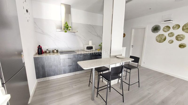 Foto fc7e6dba-a827-40bb-8f51-b684f979bd1a. Planta baixa a Lavadores Vigo