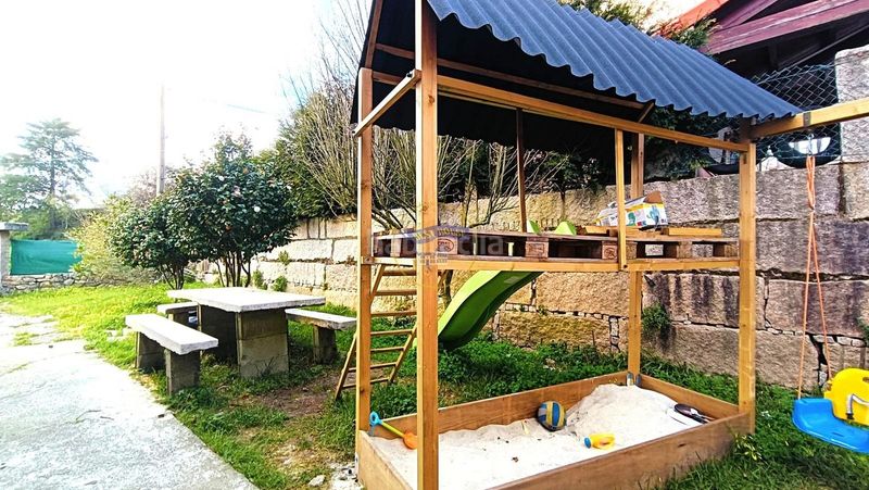 Foto d9ccd9fd-ee44-4a4d-a444-01d77d5a31f0. Casa amb calefacció aparcament a Cabral - Candeán Vigo