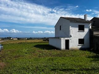 Casa aparellada a Villaguiz 22. Casa con finca en ribadeo
