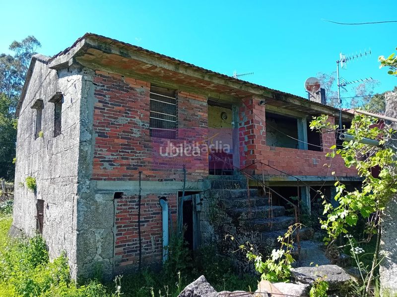 Foto d3fad784-3c9d-4da2-bda8-489a6b9e59b2. Casa adossada a Ponteareas
