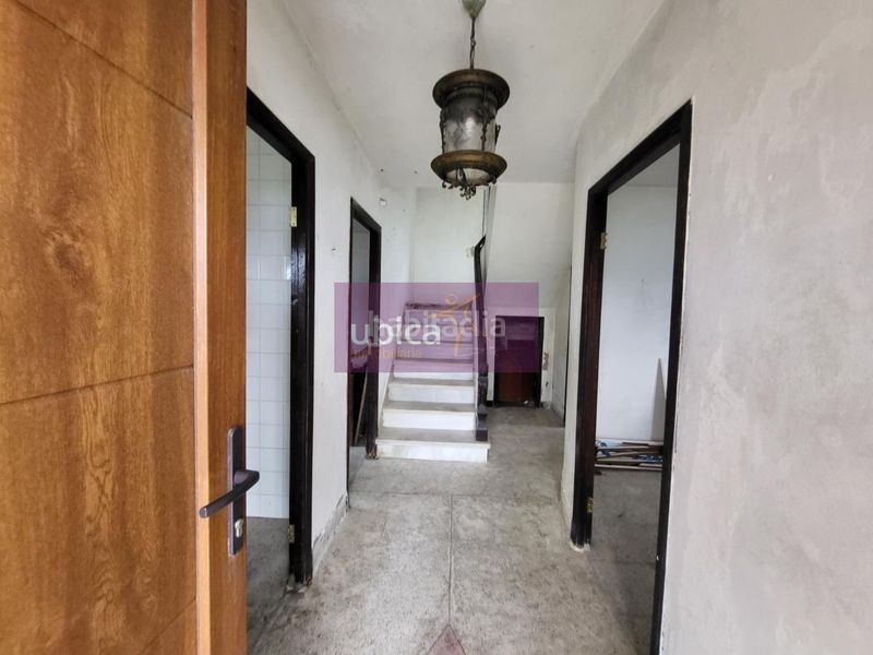 Foto 37045574-a8c8-44d1-9788-4dc7dadc65fe. Casa amb aparcament a Redondela
