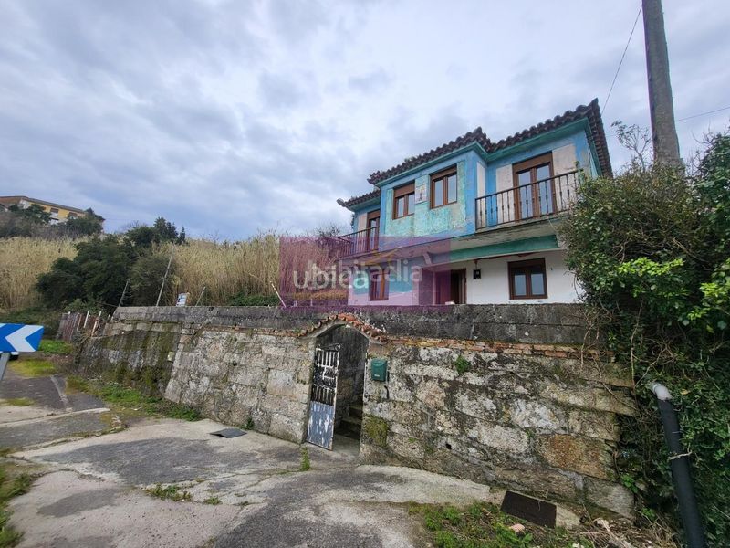 Foto 93299c9e-ee69-46c9-ba1b-9a649d027d0f. Casa amb aparcament a Redondela