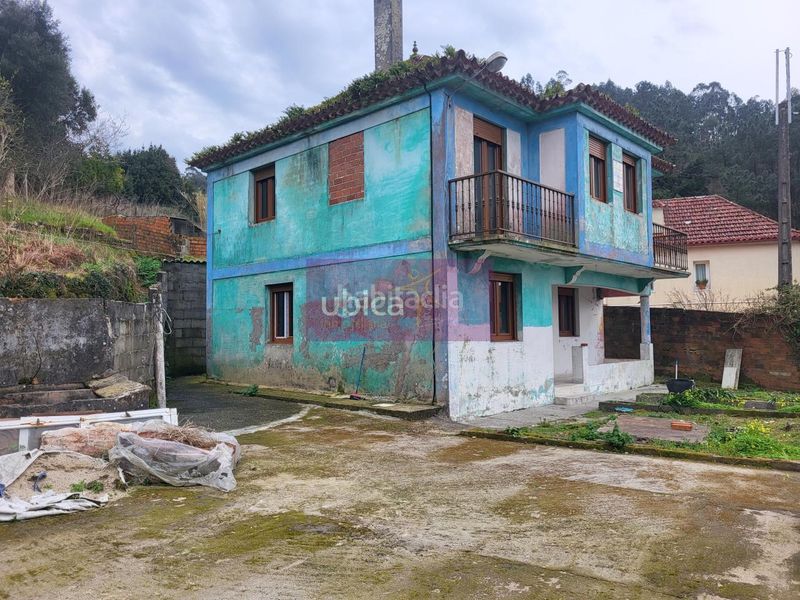 Foto 998a7d99-40a0-435e-b944-d44c615ebd53. Casa amb aparcament a Redondela