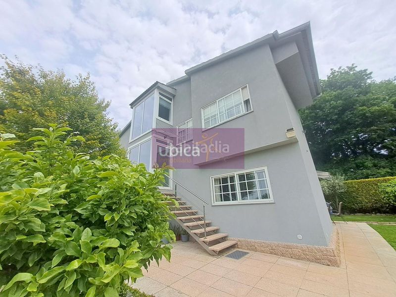 Foto 126aaa87-f8bf-41db-a867-134891415be8. Casa amb calefacció aparcament a Lavadores Vigo