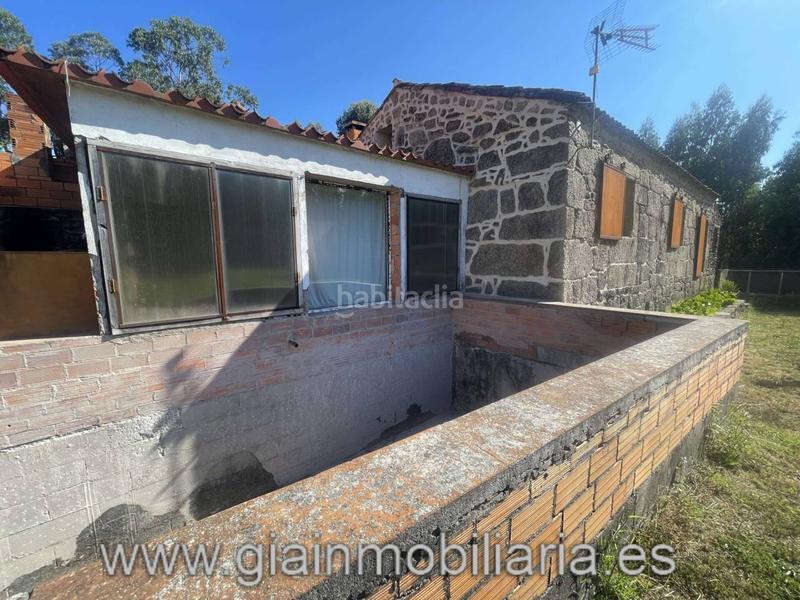 Foto 249a523b-000d-401a-a6bf-bb553e1fa45b. House with heating parking in Ponteareas