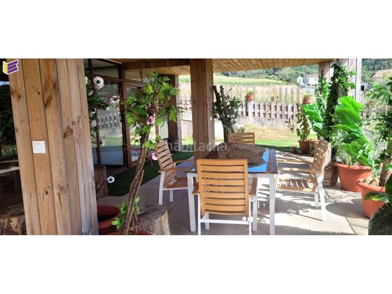 Foto 18be4c5a-7690-445f-b754-0f422e7a7460. Casa  independiente con grandes terrazas y vistas infinitas !! en Laracha