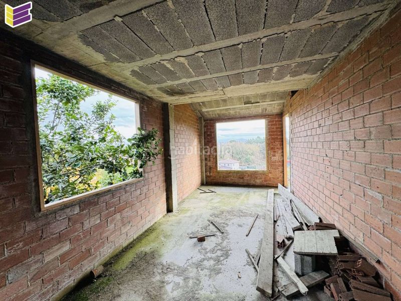 Foto a31b63f2-2a54-4f4f-8d89-ca98df74fa98. Haus mit parking in Porriño (O)
