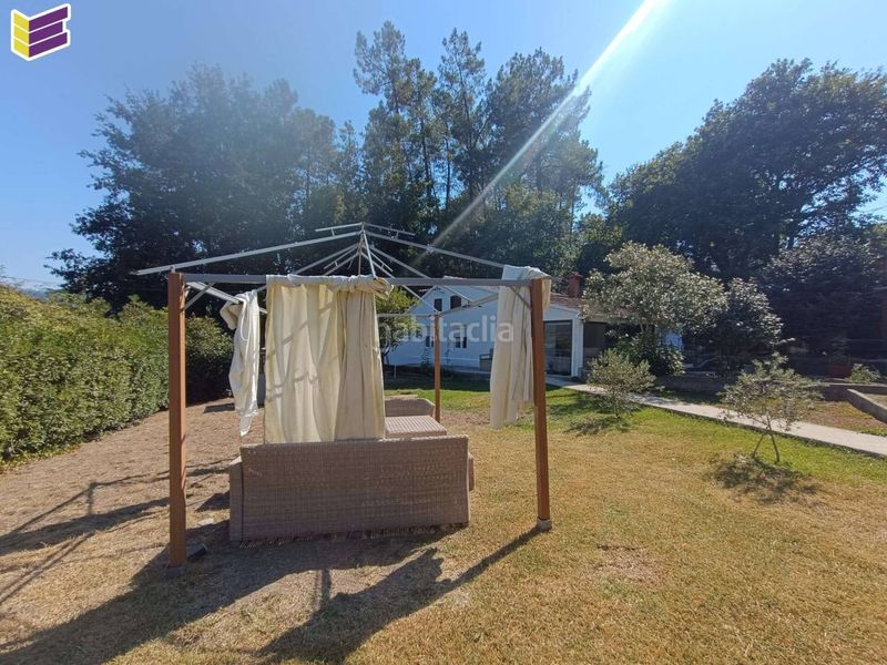 Foto c3c7b2f9-99d7-4ee1-8a3d-e6575b5a2a6e. Casa amb calefacció aparcament piscina a Mondariz