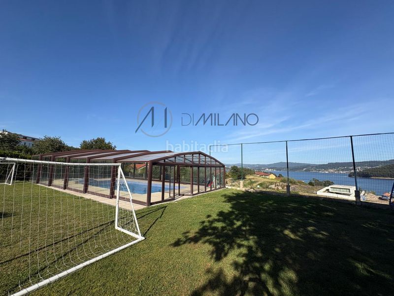 Foto 680b85e9-abd3-4553-8060-91aba2d99e8e. Casa con riscaldamento parcheggio piscina in Combarro Poio