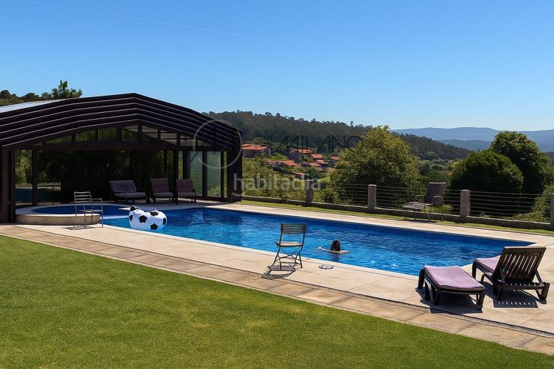 Foto 02540924-d779-4cca-9453-feab607529ce. House with heating parking pool in Poio