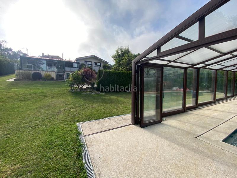 Foto 648485b2-5215-4d04-b998-5fc853649cc4. House with heating parking pool in Poio