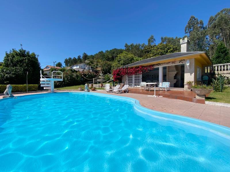 Foto 25a757c9-327a-4658-8506-d595948c2d6c. Chalet en Darbo Cangas