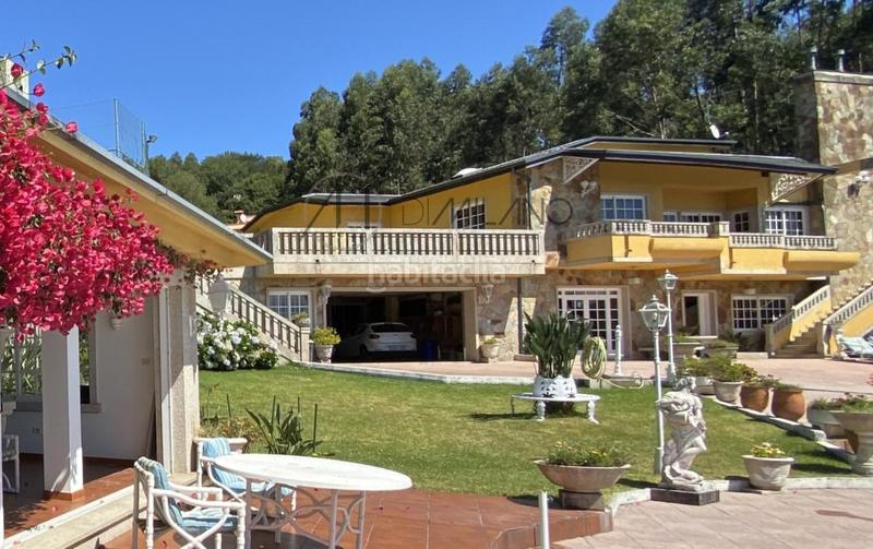 Foto 7cb1894c-225b-44a7-ac7a-52b6e37ce707. Chalet con riscaldamento parcheggio piscina in Darbo Cangas