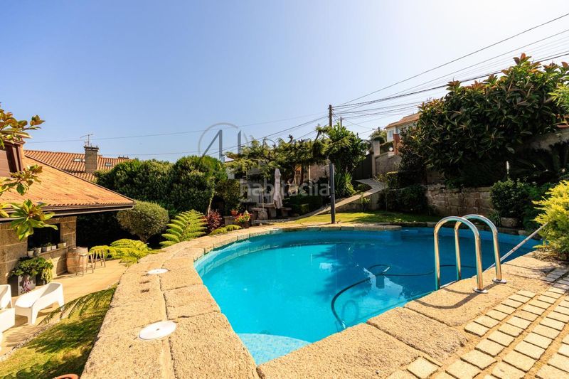 Foto 79208a5d-a1e9-4038-95ff-6ec109f790aa. Chalet con riscaldamento parcheggio piscina in Panxón Nigrán
