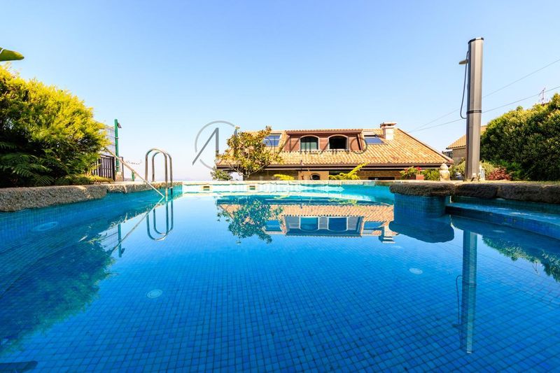 Foto d6e6fc4c-28b8-4b39-b716-337be2ecde2a. Chalet con riscaldamento parcheggio piscina in Panxón Nigrán