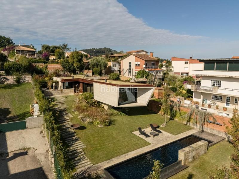 Foto 116b8ea9-6cf7-4437-820e-db90e66b1eed. Casa con riscaldamento parcheggio piscina in Panxón Nigrán