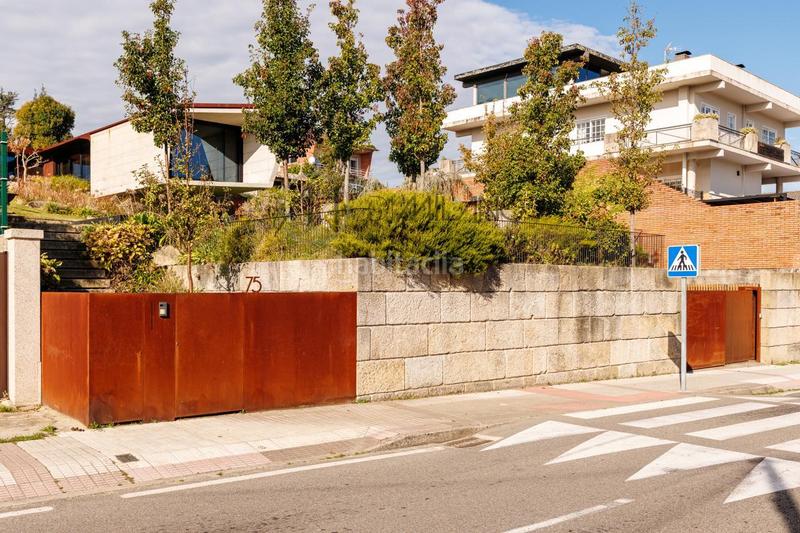 Foto 1d186a4c-427c-469e-a88e-3d851ab93de3. Casa con riscaldamento parcheggio piscina in Panxón Nigrán