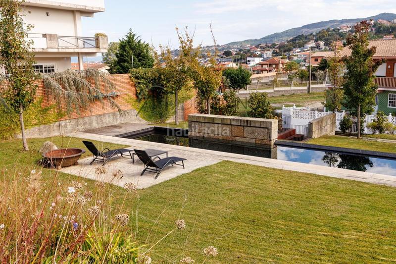 Foto 213479a8-683a-4237-9ef9-03982298936c. Casa con riscaldamento parcheggio piscina in Panxón Nigrán