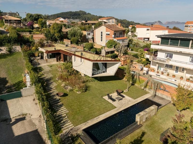 Foto 4ffea441-d74e-42c1-b656-2669dc28d95a. Casa con riscaldamento parcheggio piscina in Panxón Nigrán