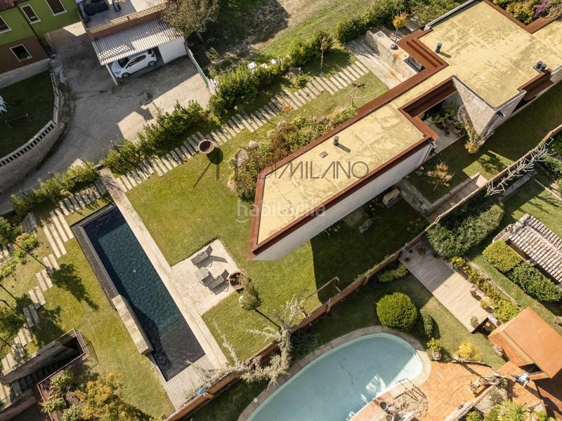 Foto acd41266-2616-49a6-ac5a-b2c05ab44461. Casa con riscaldamento parcheggio piscina in Panxón Nigrán