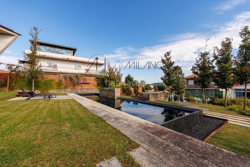 Foto b7023019-56dd-4562-9464-7afbee5c4ec5. Casa con riscaldamento parcheggio piscina in Panxón Nigrán