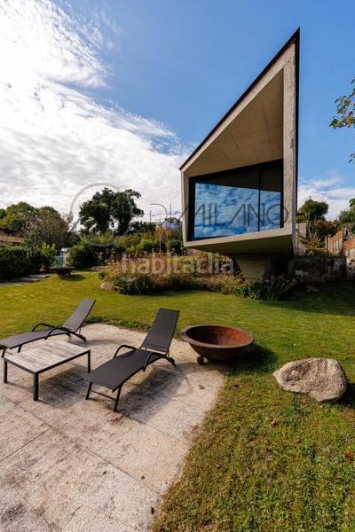 Foto c2c86947-54f9-4fbe-b289-9c3ec365f057. Casa con riscaldamento parcheggio piscina in Panxón Nigrán