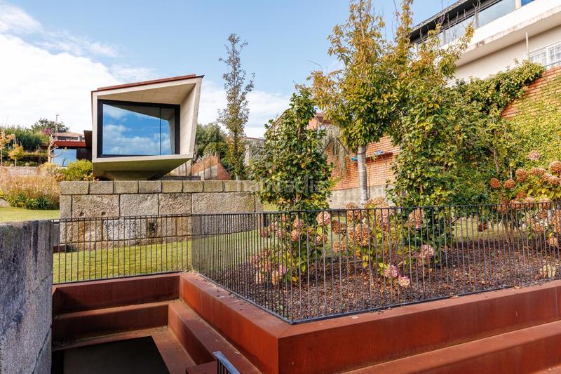 Foto c7dde8fb-d6af-4b78-ba28-be9e326dc0a8. Casa con riscaldamento parcheggio piscina in Panxón Nigrán