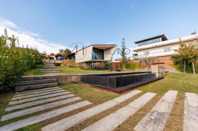 Foto d068221a-66d3-4d5f-acd2-e2a937030a89. Casa con riscaldamento parcheggio piscina in Panxón Nigrán