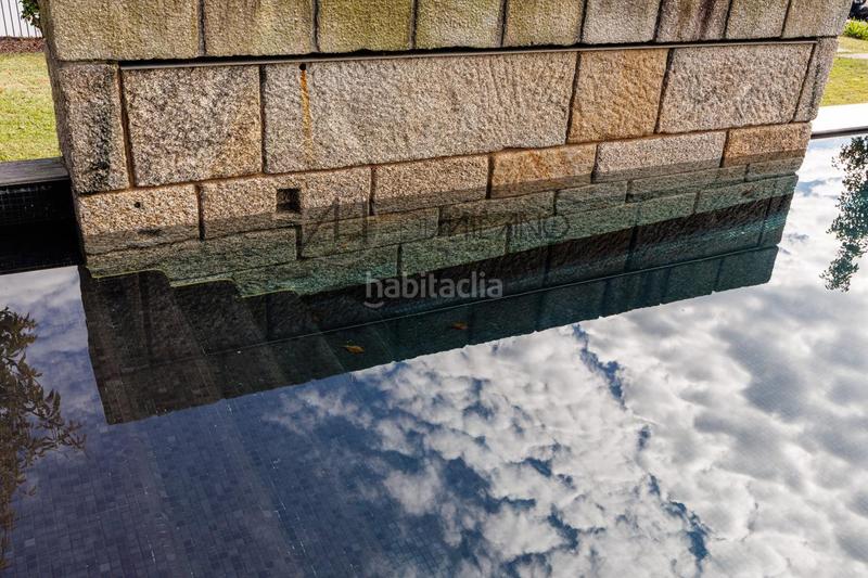 Foto db32f597-cb32-46f9-bfa8-6208900f3eea. Casa con riscaldamento parcheggio piscina in Panxón Nigrán