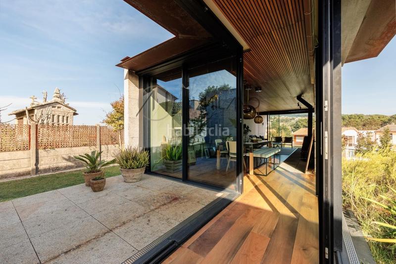 Foto fb15ce76-69f6-4b34-a979-aea98f633d63. Casa con riscaldamento parcheggio piscina in Panxón Nigrán